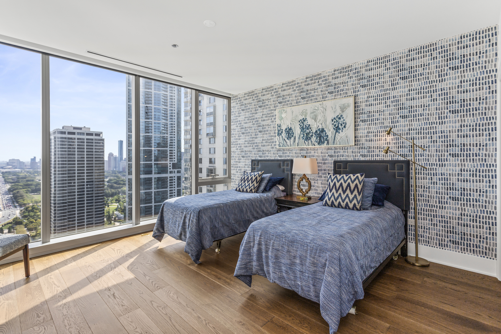 363 East Wacker Drive, Unit 2503 Chicago, IL 60601 - Photo 24 of 52 a bedroom with a bed and a large window