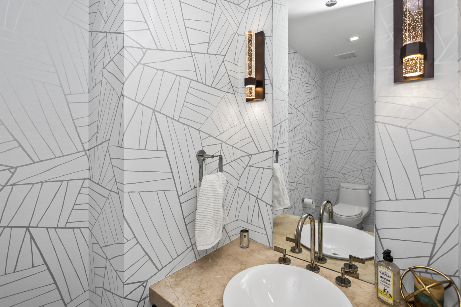 363 East Wacker Drive, Unit 2503 Chicago, IL 60601 - Photo 28 of 52 a bathroom with a sink and mirror with bathtub