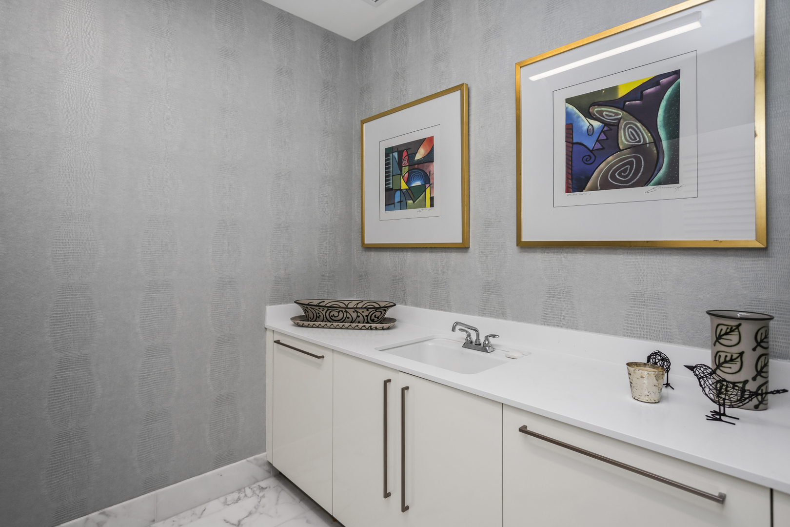 363 East Wacker Drive, Unit 2503 Chicago, IL 60601 - Photo 29 of 52 a bathroom with a sink and a mirror