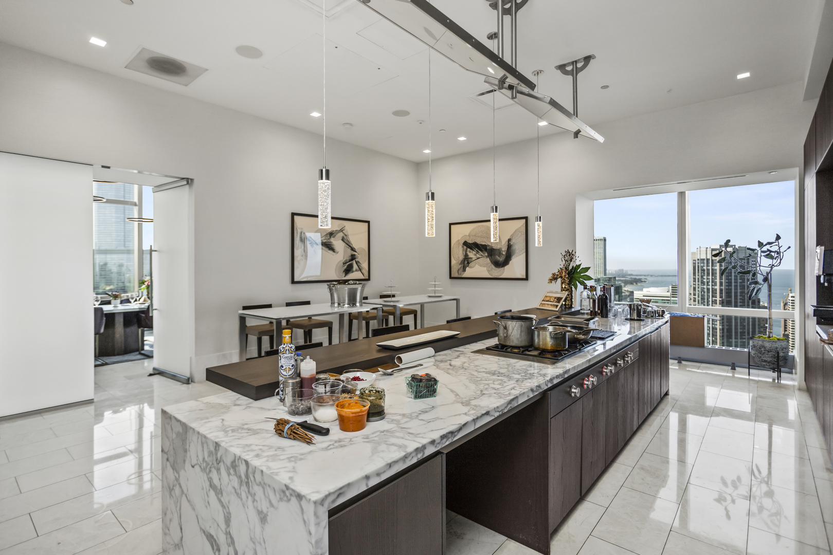 363 East Wacker Drive, Unit 2503 Chicago, IL 60601 - Photo 38 of 52 a kitchen with sink stove and cabinets