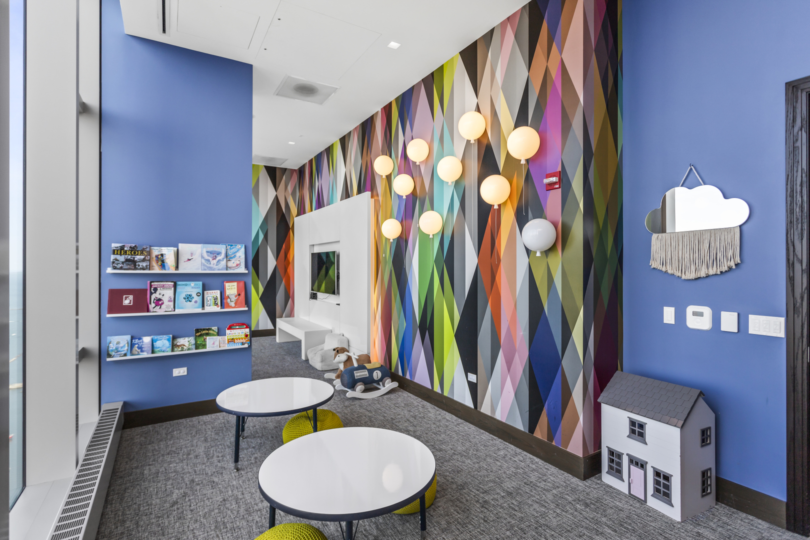 363 East Wacker Drive, Unit 2503 Chicago, IL 60601 - Photo 46 of 52 a bathroom with stainless steel appliances a sink and a large mirror