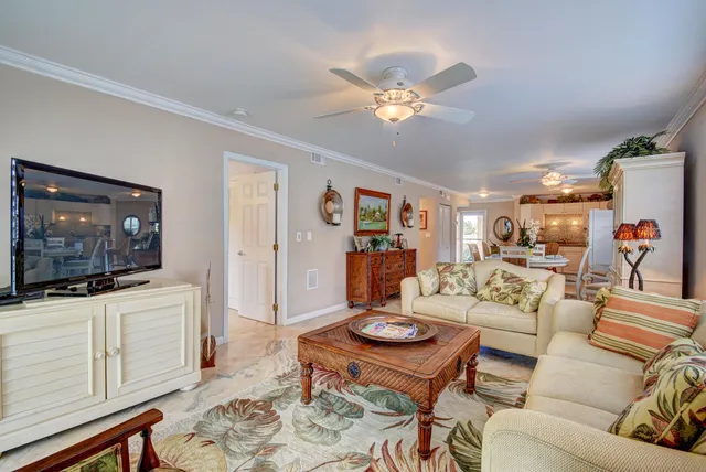 a view of a livingroom with furniture and a table