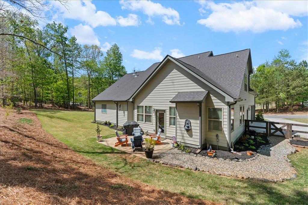 7610 Scenic Overlook Cumming, GA 30041 - Photo 43 of 62 a view of a house with back yard