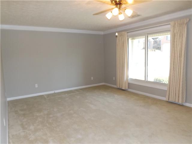 165 Mortons Lake Road Manchester, TN 37355 - Photo 3 of 18 The living room is large with lots of space for furniture.