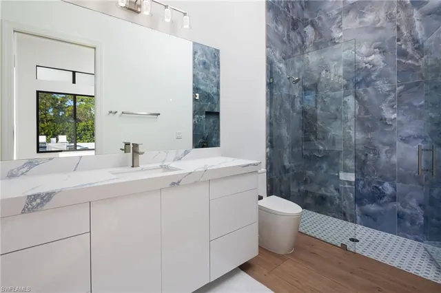 a bathroom with a sink and a toilet