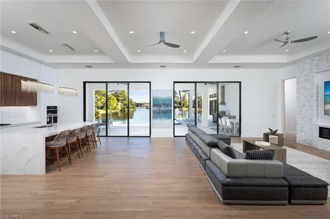 a lobby with furniture and wooden floor