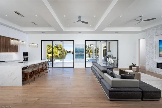 a lobby with furniture and wooden floor