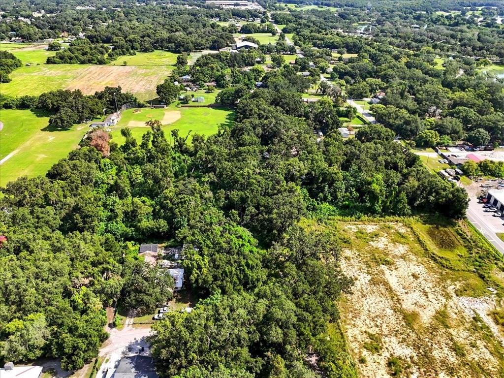 Fish Hatchery Road Lakeland, FL 33801 - Photo 11 of 16 an aerial view of residential houses with outdoor space and swimming pool