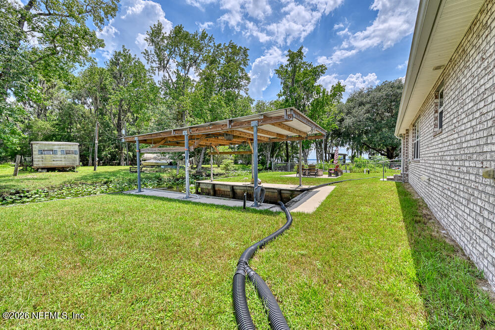 7837 Rusty Anchor Road St. Augustine, FL 32092 - Photo 24 of 41 Back Yard Showing bulkhead