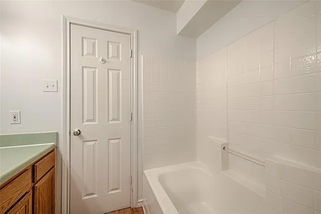 a bathroom with a bathtub
