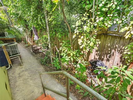 a view of a pathway in a garden