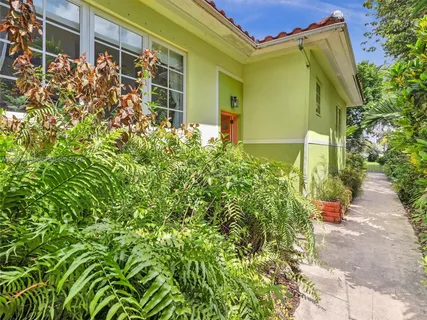 a view of a pathway with a balcony