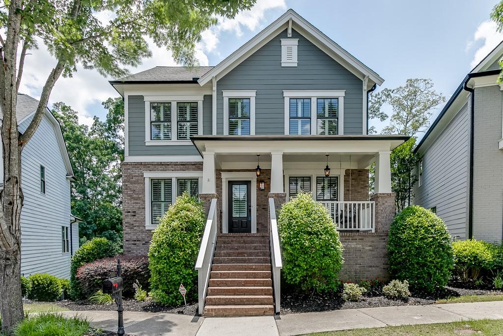 front view of a house with a yard