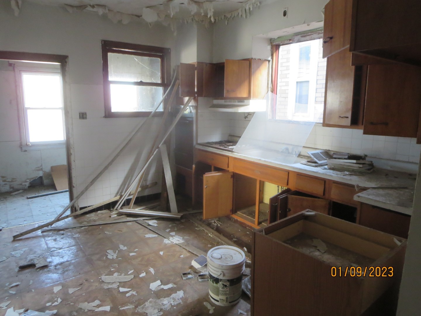 Undisclosed Address Chicago, IL 60617 - Photo 20 of 29 a kitchen with a sink a toilet and a window