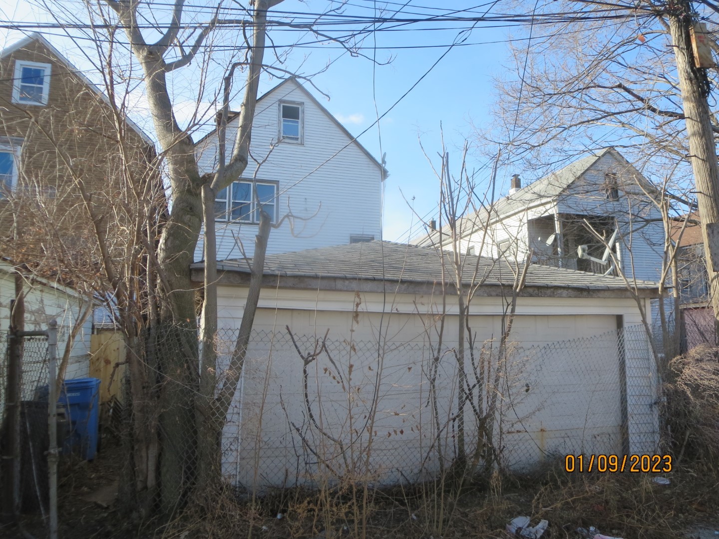 Undisclosed Address Chicago, IL 60617 - Photo 4 of 29 a view of a house with a tree