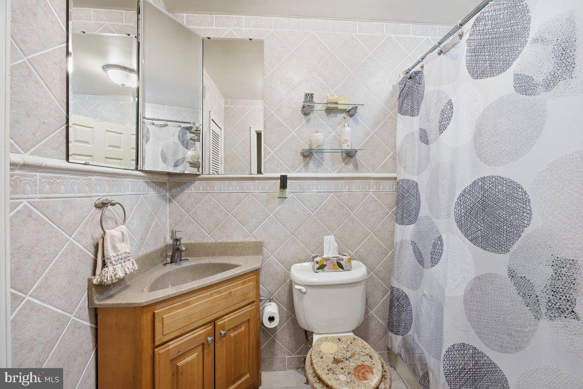 208 Timber Creek Road Lindenwold, NJ 08021 - Photo 11 of 12 a bathroom with a sink toilet and shower