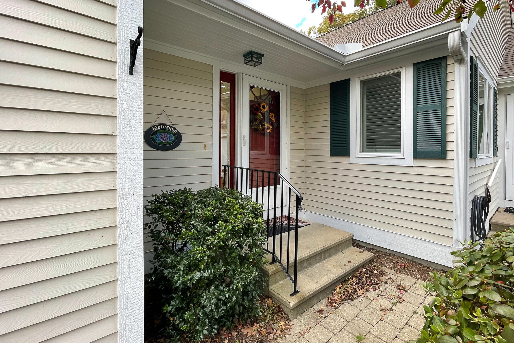 13 North Ridge Road Mashpee, MA 02649 - Photo 2 of 42 a view of a house with a door and a tree