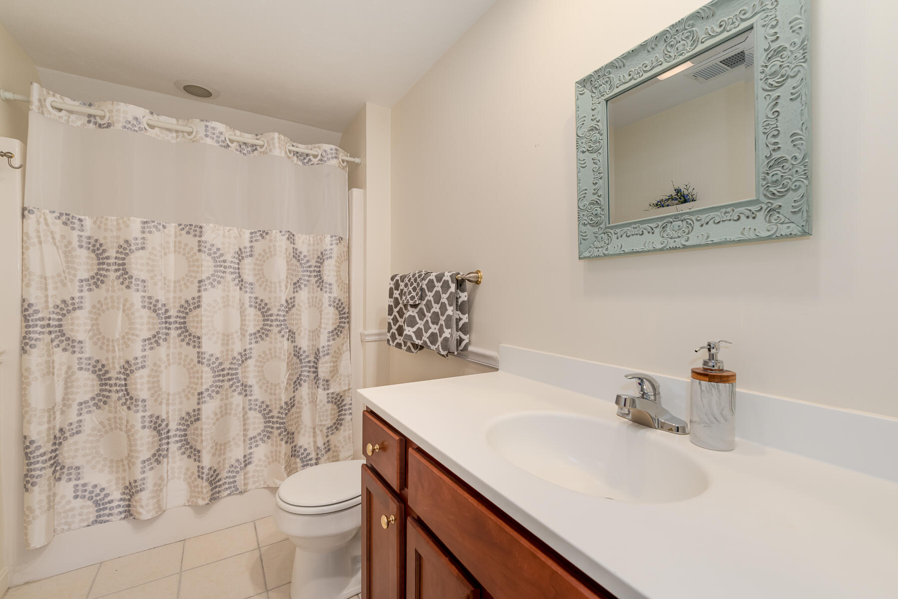 13 North Ridge Road Mashpee, MA 02649 - Photo 24 of 42 a bathroom with a sink and a mirror