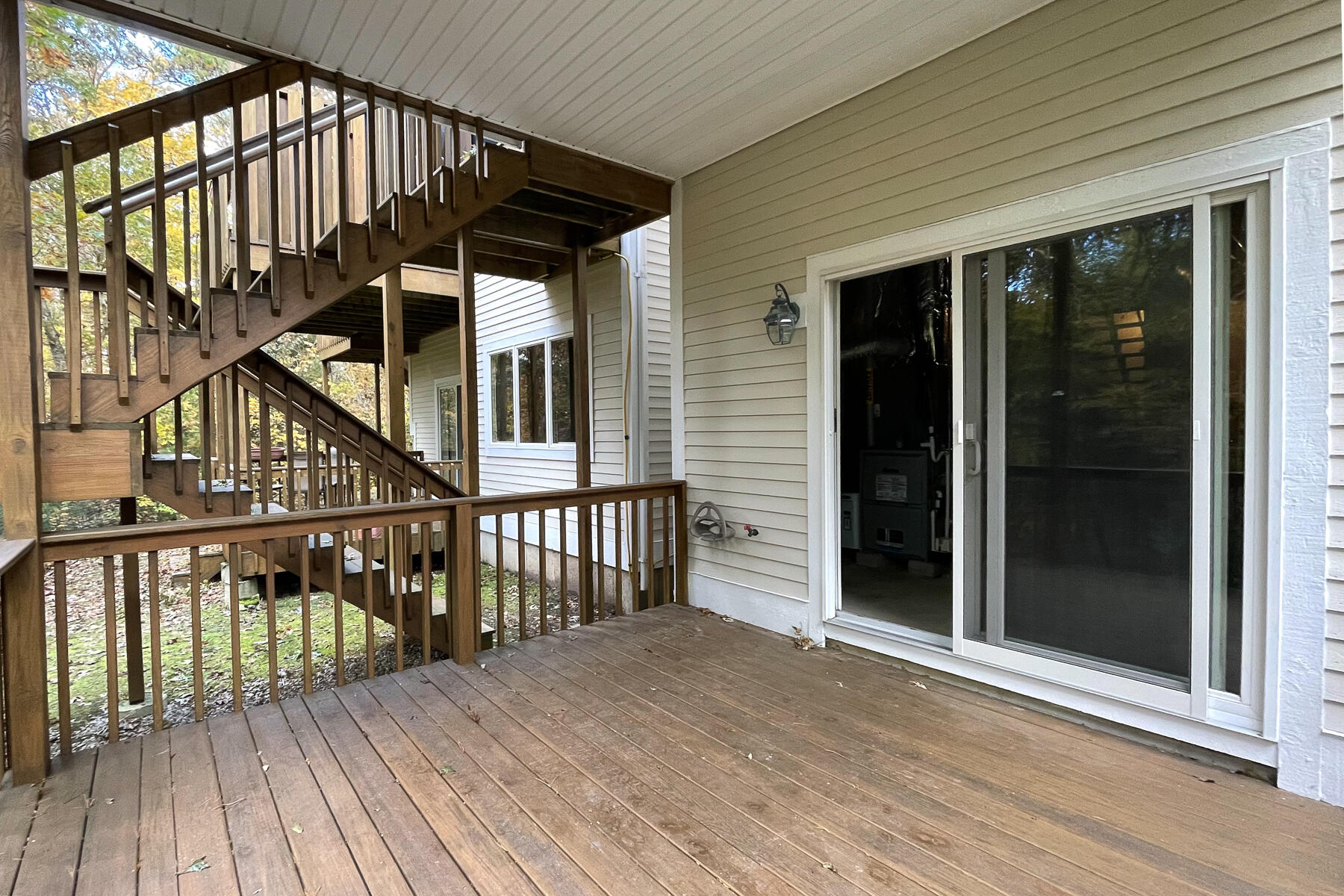 13 North Ridge Road Mashpee, MA 02649 - Photo 27 of 42 a view of balcony with wooden floor and floor to ceiling window