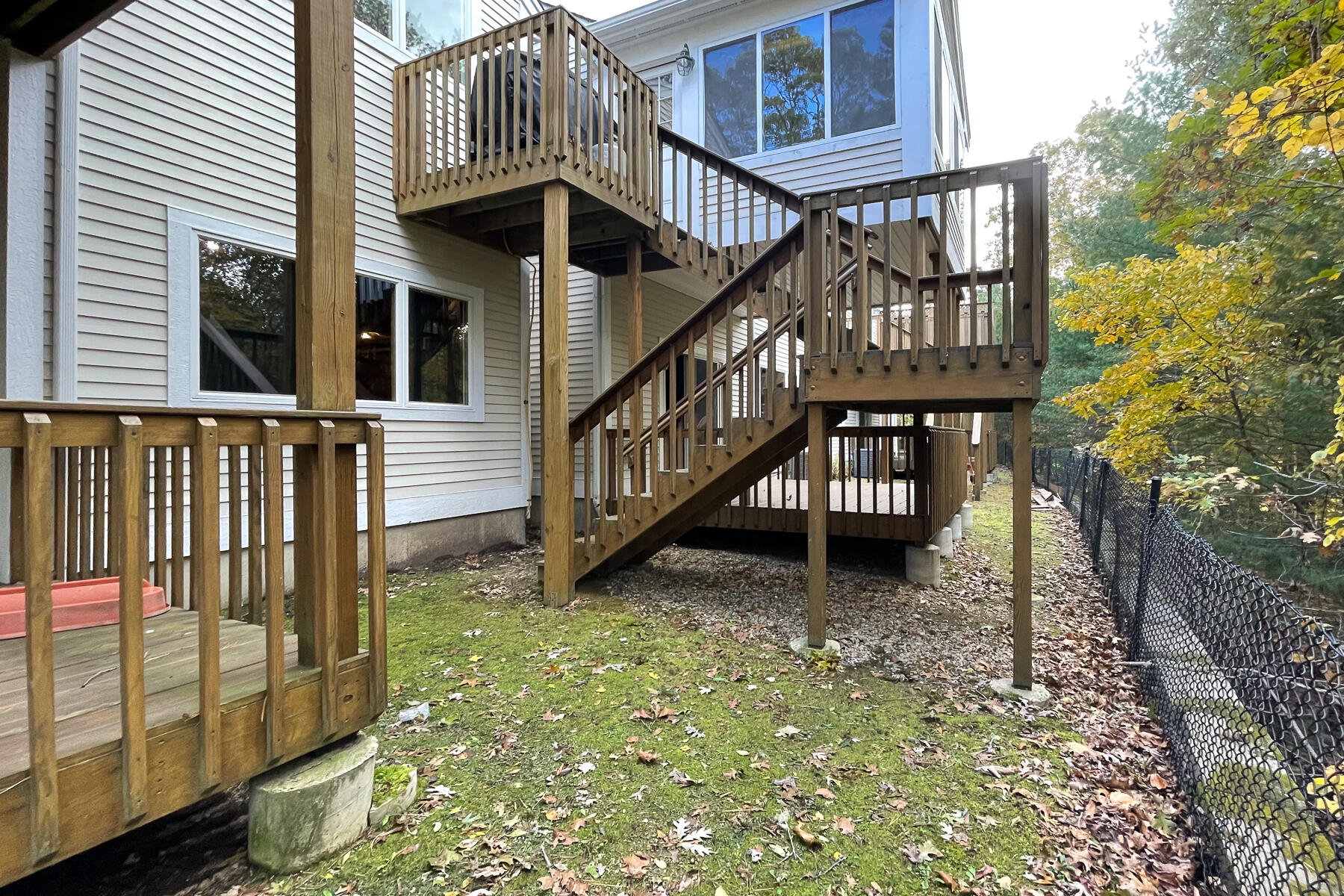 13 North Ridge Road Mashpee, MA 02649 - Photo 28 of 42 a view of a house with backyard and deck