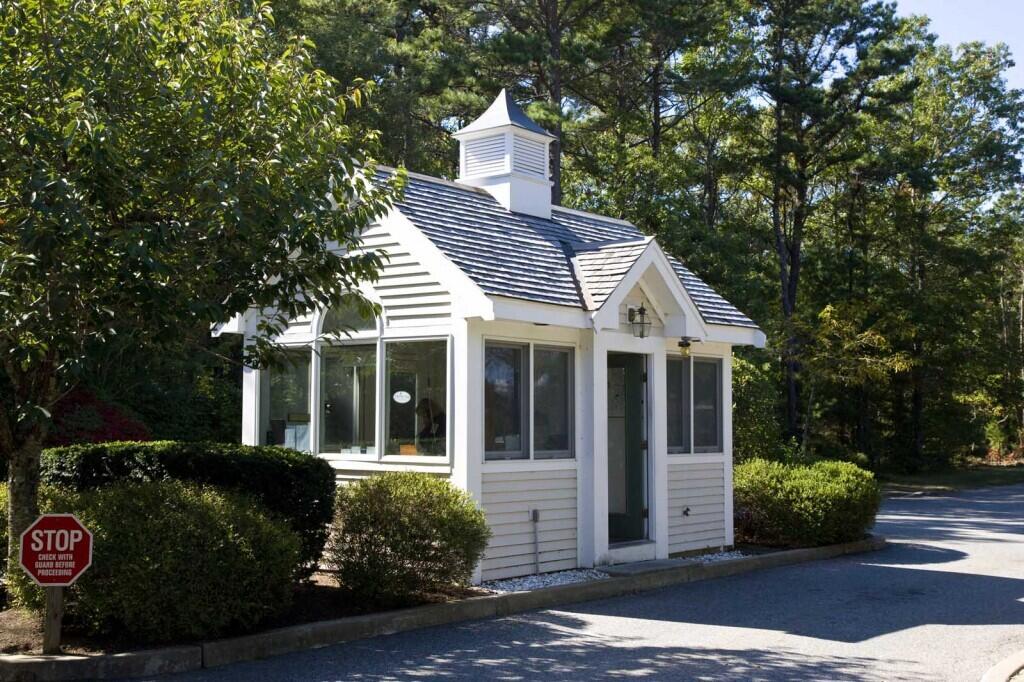 13 North Ridge Road Mashpee, MA 02649 - Photo 39 of 42 a front view of a house with a garden