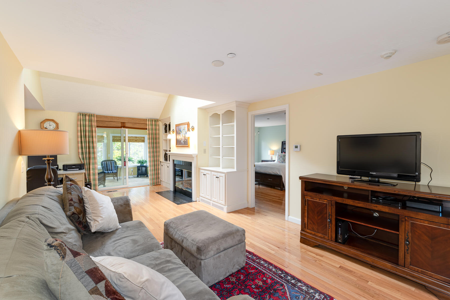 13 North Ridge Road Mashpee, MA 02649 - Photo 9 of 42 a living room with furniture and a flat screen tv