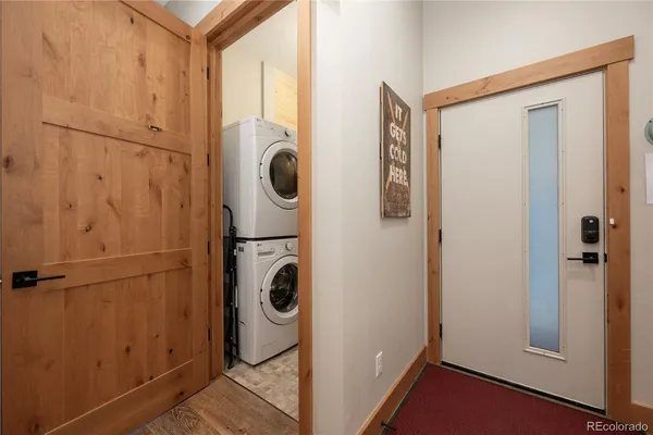 a bedroom with beds and a window