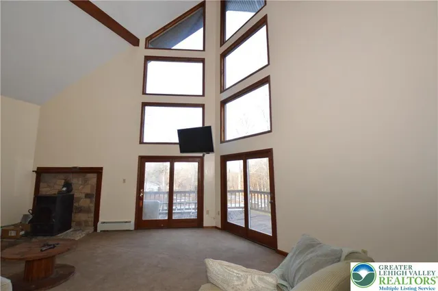 a view of an empty room and window