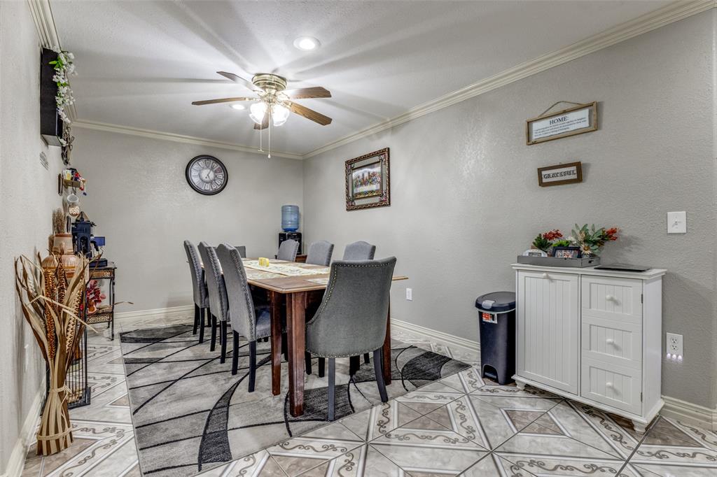 1590 Farm Road 2352 Sumner, TX 75486 - Photo 25 of 40 a view of a dining room with furniture and window