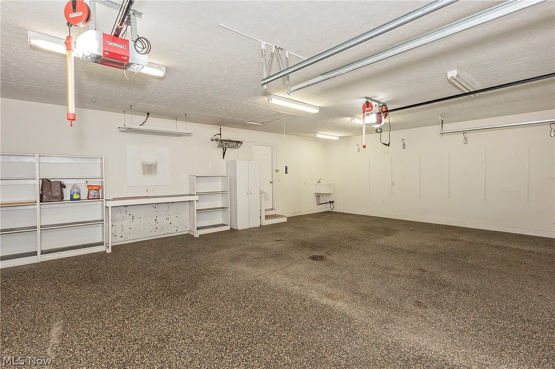 6635 Liberty Road Solon, OH 44139 - Photo 34 of 44 3 car garage w/nature stone flooring