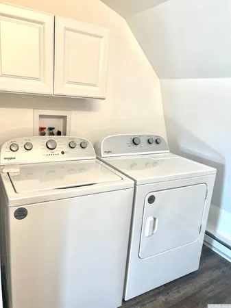 a utility room with dryer and washer