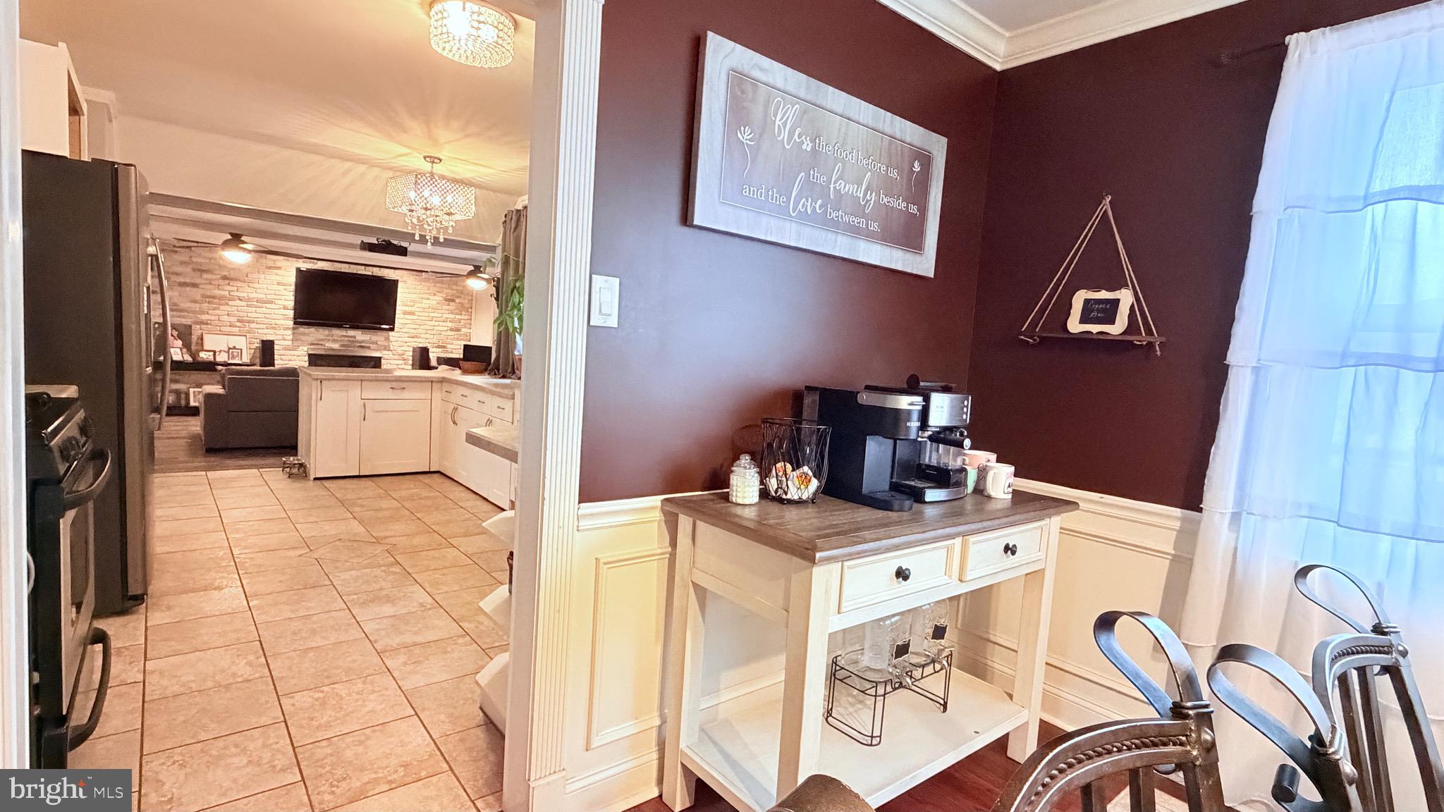 9 East Kennedy Drive Clementon, NJ 08021 - Photo 13 of 60 a kitchen with a stove a refrigerator and a microwave