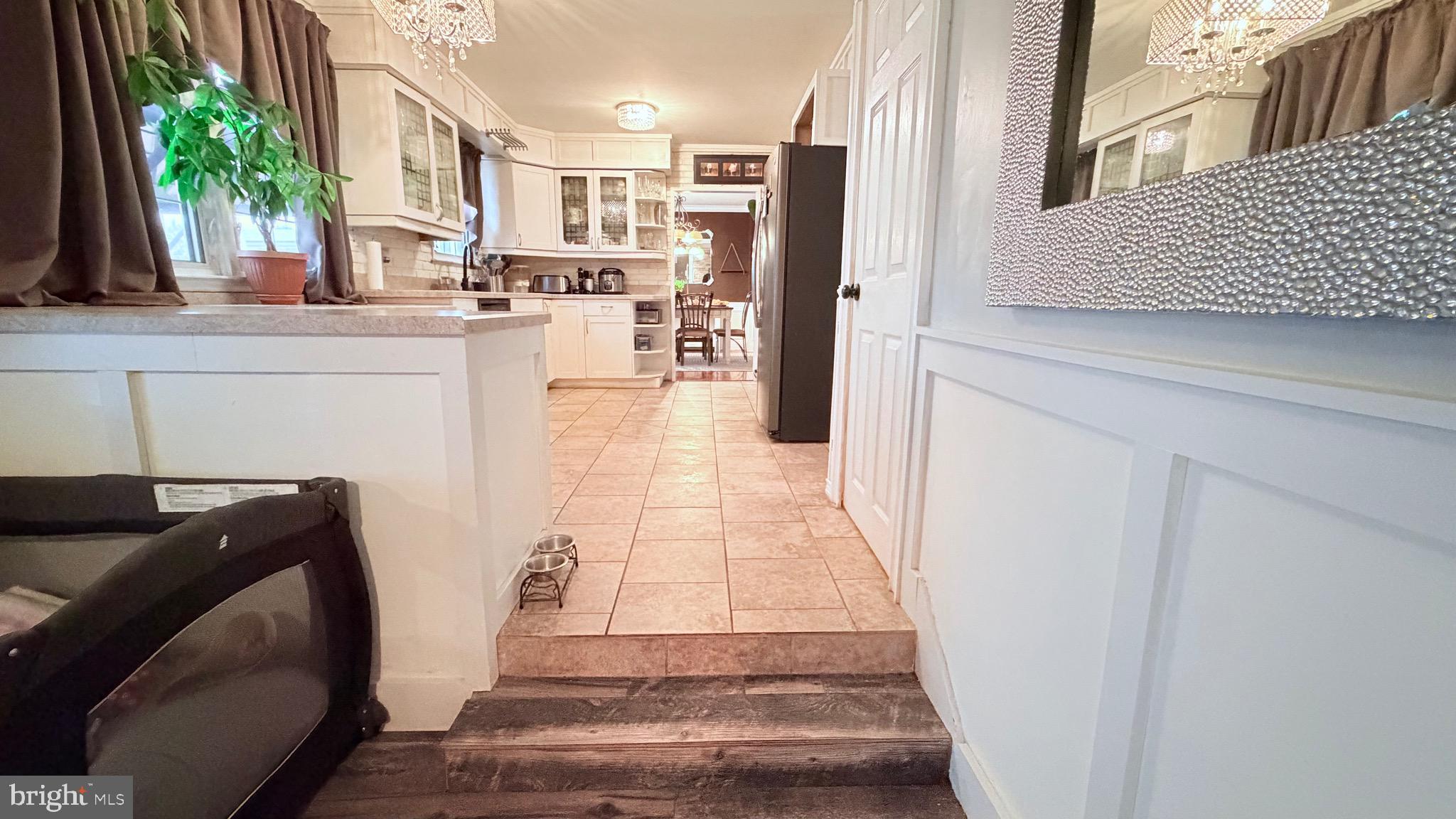 9 East Kennedy Drive Clementon, NJ 08021 - Photo 19 of 60 a view of a kitchen from the hallway