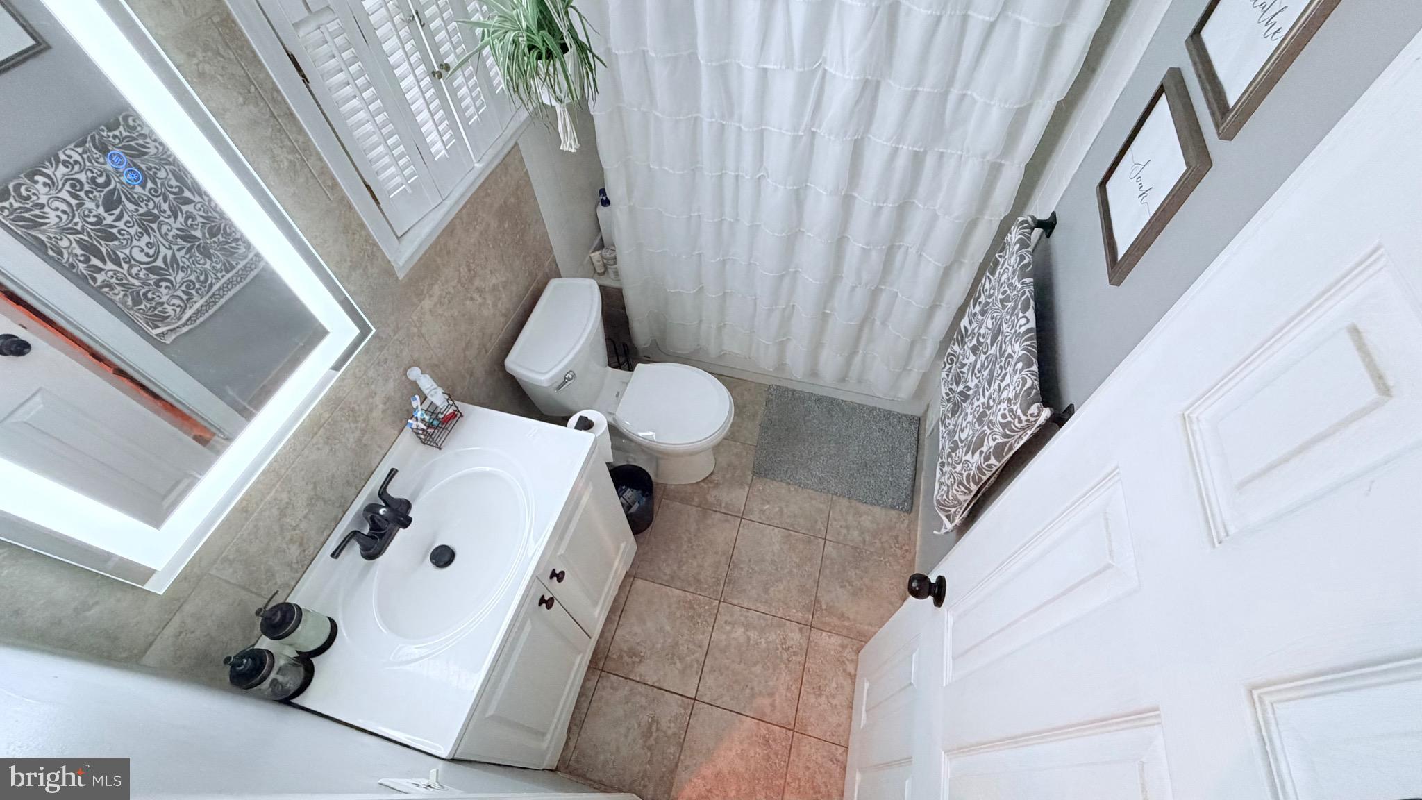 9 East Kennedy Drive Clementon, NJ 08021 - Photo 28 of 60 a bathroom with a sink and toilet