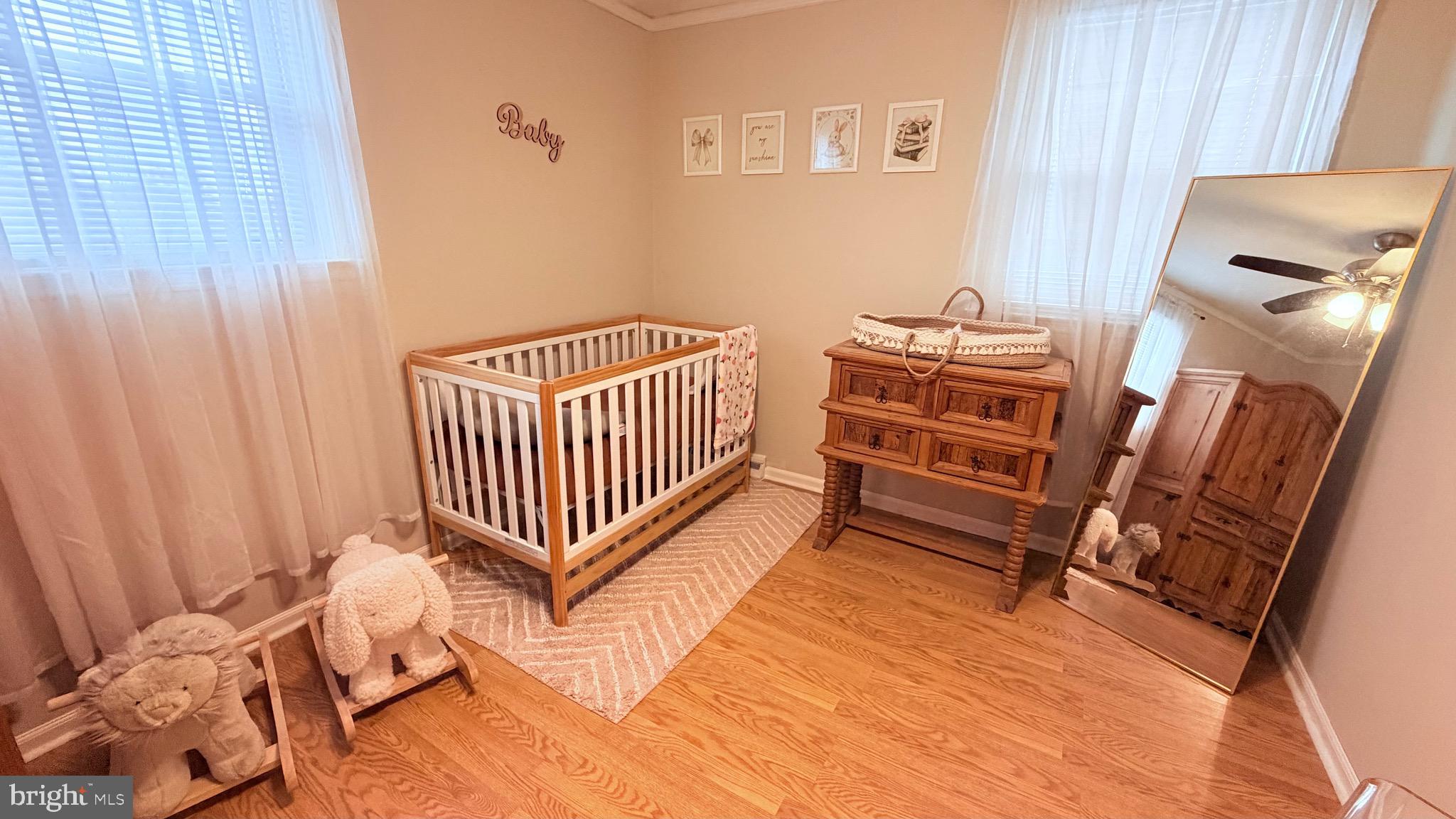 9 East Kennedy Drive Clementon, NJ 08021 - Photo 37 of 60 a bedroom with a chair and a window