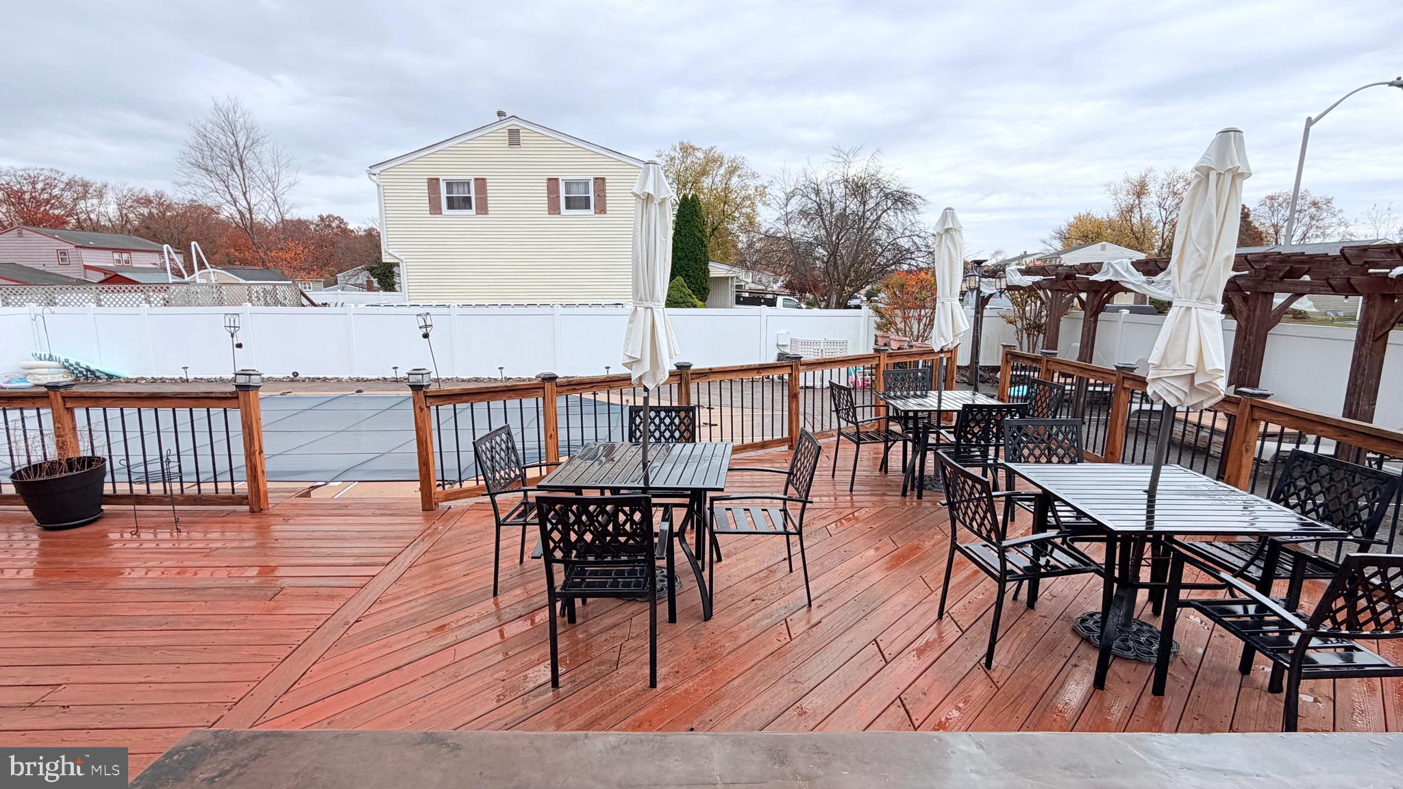 9 East Kennedy Drive Clementon, NJ 08021 - Photo 41 of 60 a view of a roof deck dining table and chairs