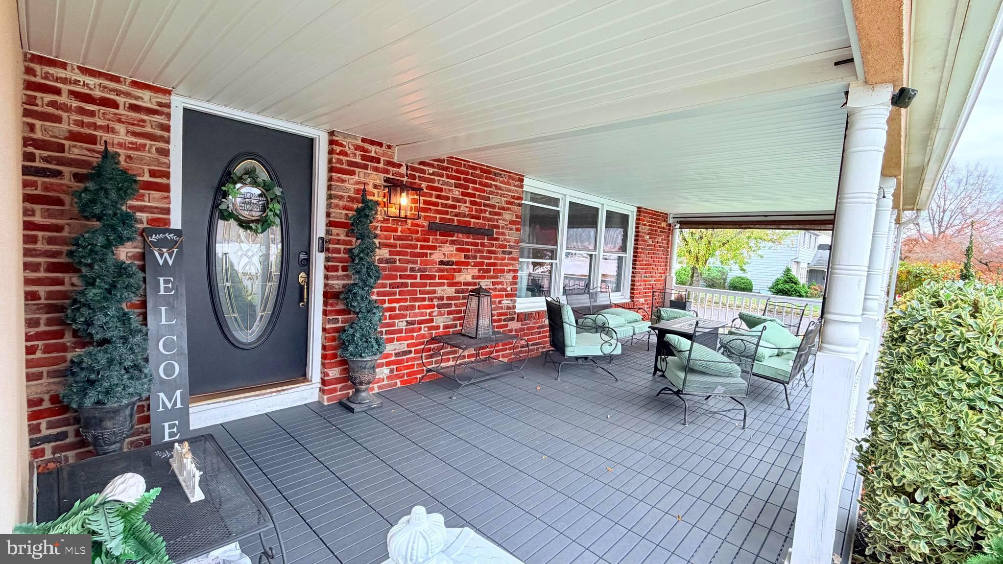 9 East Kennedy Drive Clementon, NJ 08021 - Photo 5 of 60 a view of porch with a table and chairs and potted plants