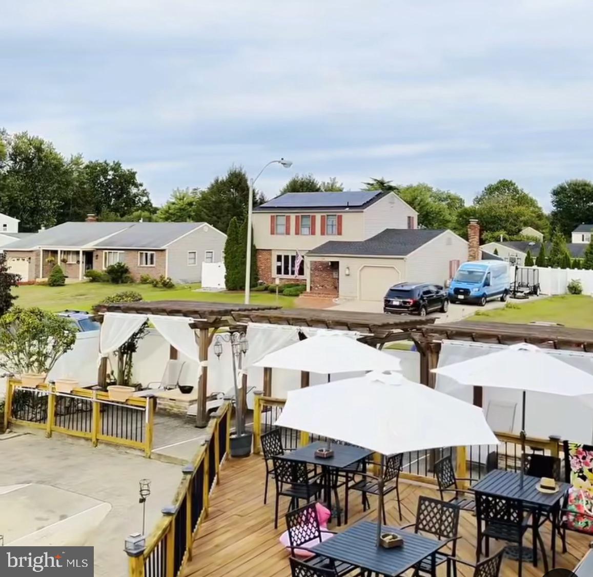 9 East Kennedy Drive Clementon, NJ 08021 - Photo 54 of 60 a view of a patio with swimming pool table and chairs