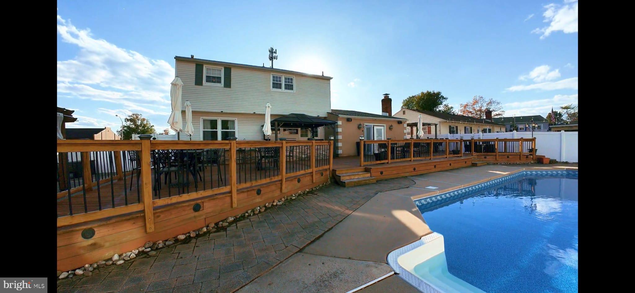 9 East Kennedy Drive Clementon, NJ 08021 - Photo 55 of 60 a view of a large building with a swimming pool