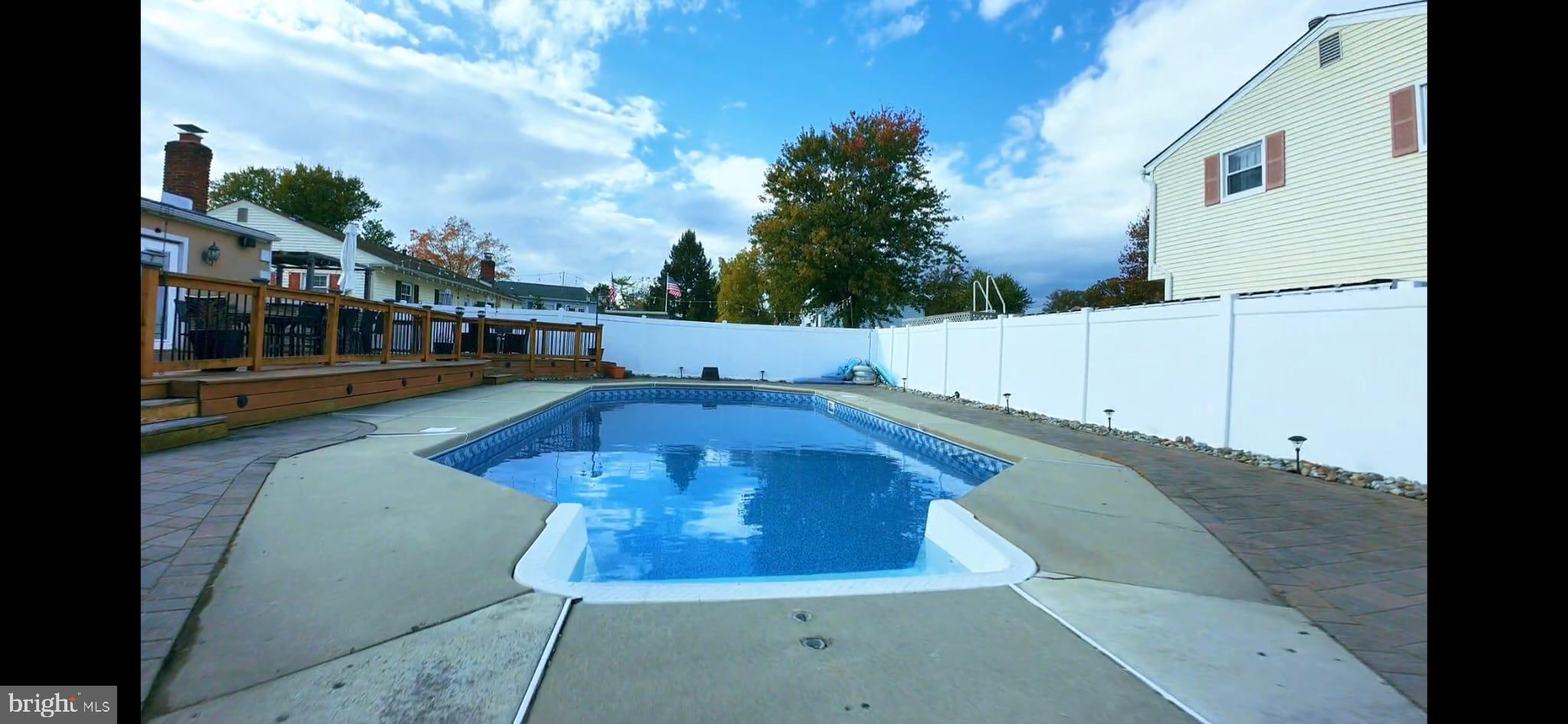 9 East Kennedy Drive Clementon, NJ 08021 - Photo 57 of 60 a view of a swimming pool with a yard