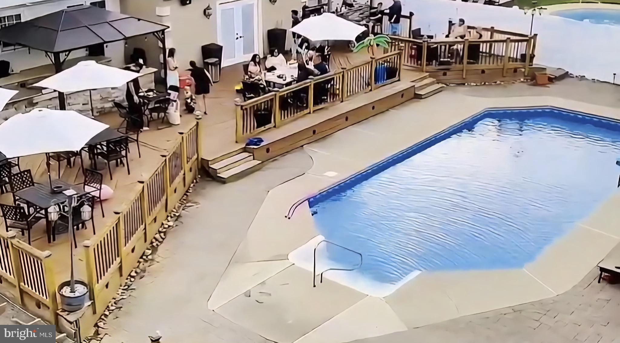 9 East Kennedy Drive Clementon, NJ 08021 - Photo 58 of 60 a view of a swimming pool with outdoor seating