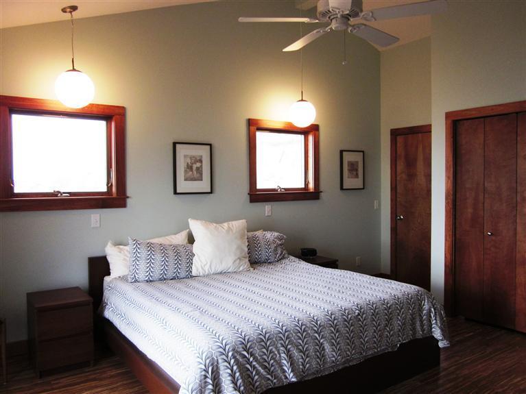 80 2nd Avenue Wellfleet, MA 02642 - Photo 14 of 35 a bedroom with a bed and a chandelier