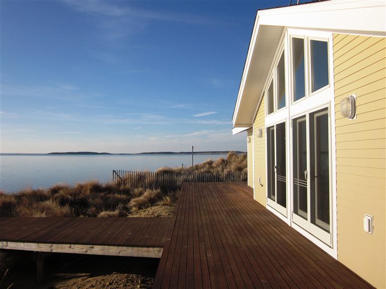 80 2nd Avenue Wellfleet, MA 02642 - Photo 22 of 35 a view of balcony with wooden floor and lake view