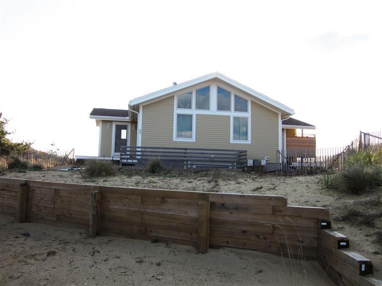80 2nd Avenue Wellfleet, MA 02642 - Photo 34 of 35 a front view of a house with a yard