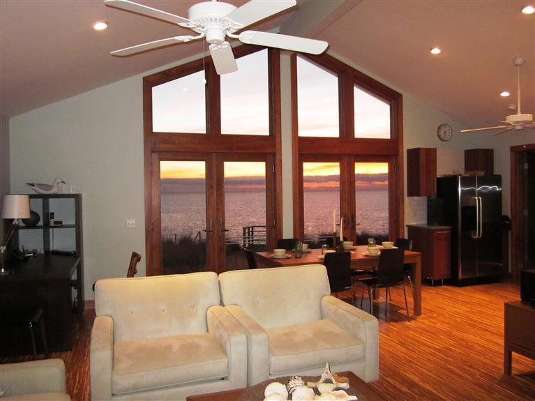 80 2nd Avenue Wellfleet, MA 02642 - Photo 5 of 35 a living room with furniture and a floor to ceiling window