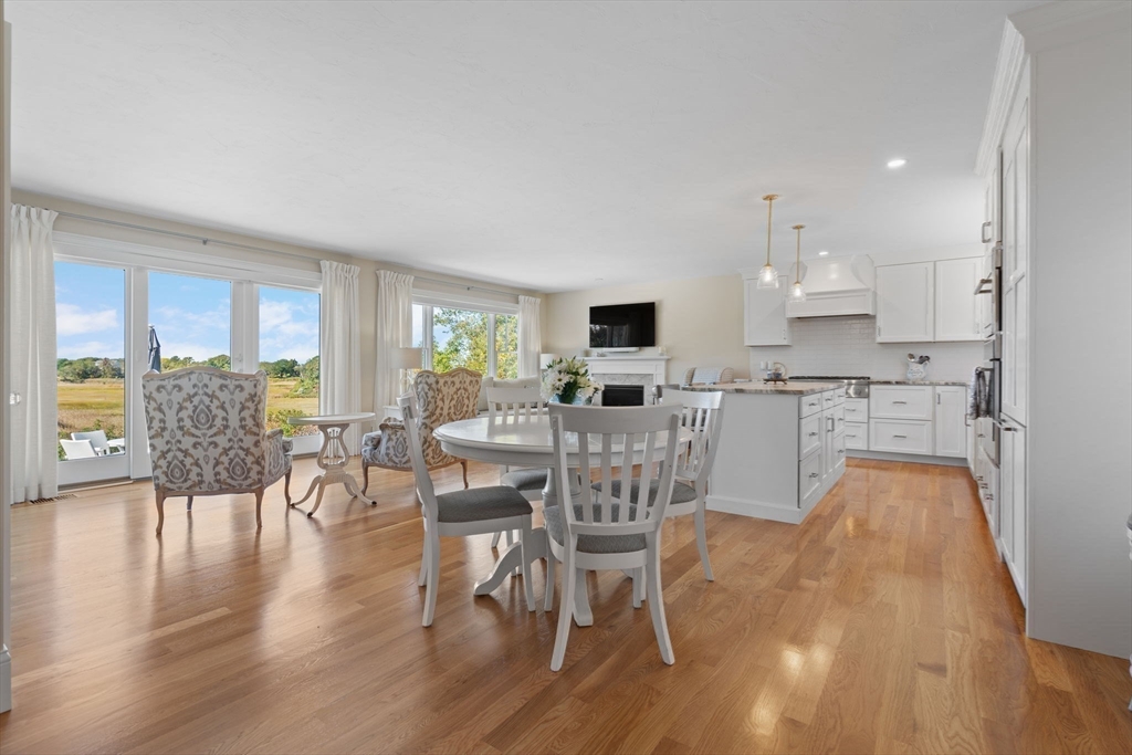 191 Stoney Point Road Barnstable, MA 02675 - Photo 14 of 36 a view of kitchen with cabinets and wooden floor