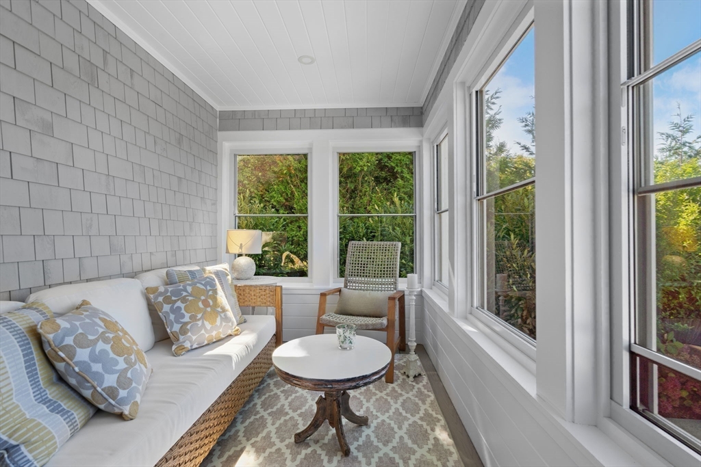 191 Stoney Point Road Barnstable, MA 02675 - Photo 16 of 36 a living room with furniture and a large window