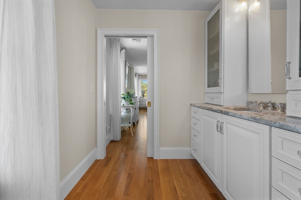 191 Stoney Point Road Barnstable, MA 02675 - Photo 29 of 36 a bathroom with a sink and a mirror