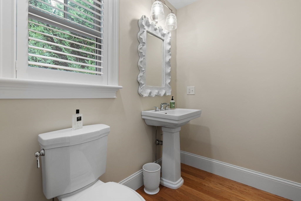 191 Stoney Point Road Barnstable, MA 02675 - Photo 31 of 36 a bathroom with a sink toilet and a mirror