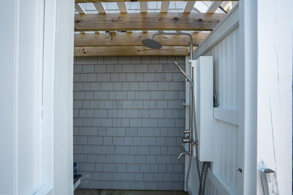 191 Stoney Point Road Barnstable, MA 02675 - Photo 6 of 36 a bathroom with a shower